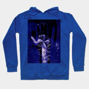 Digital collage and special processing. Hand full of spikes. Cursed. Blue. Hoodie